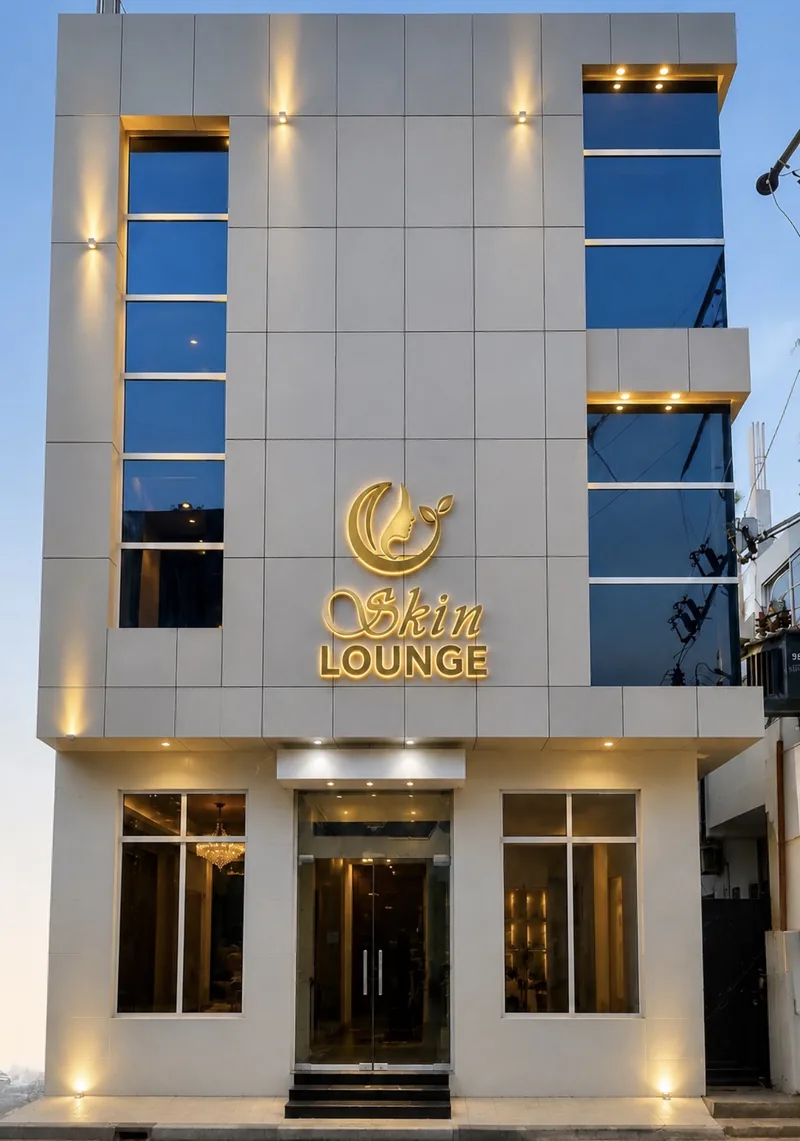 The clinic building on Phalia Road, lit at dusk